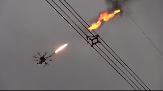 Flame Throwing Drone Helps Remove Net on UHV Power Line [upl. by Merow]